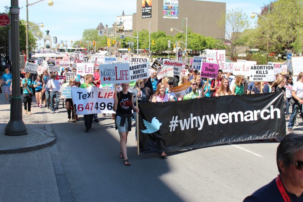 Protesters march through Ottawa streets. 