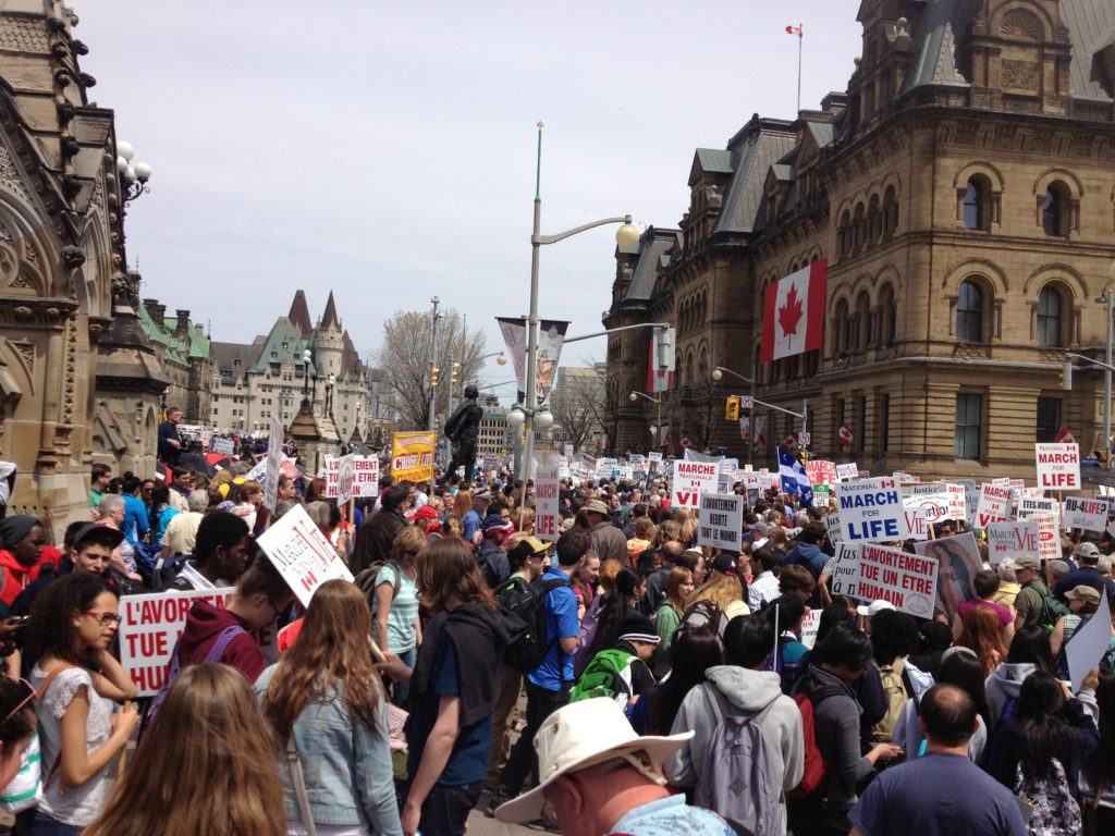 Thousands leave Parliament Hill to march through Ottawa's streets. 