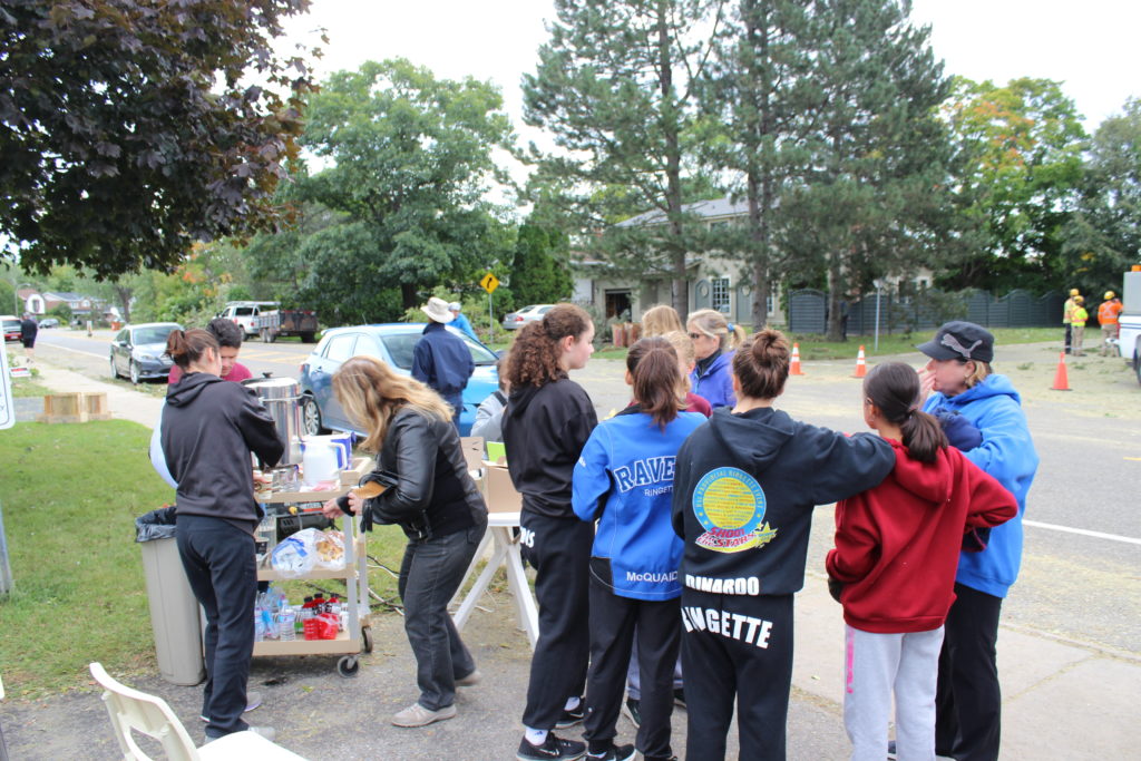 Community members gathered at Arlington Woods for food and drinks while the neighbourhood was cleaned up. 